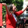 A woman waves a national flag during a demonstration to celebrate Tunisia's independence, Tuesday, March, 20, 2012 in Tunis. On March 20, 1956, Tunisia achieved independence from France proposed by Habib Bourguiba, who became the first President of the Republic of Tunisia. (AP Photo/Hassene Dridi)